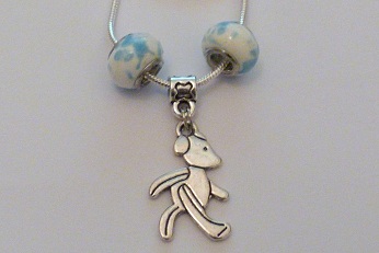 Collier fantaisie ourson dans les nuages